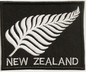 Partially embroidered silver fern patch of new zealand in black & white includes new zealand in text made in new zealand