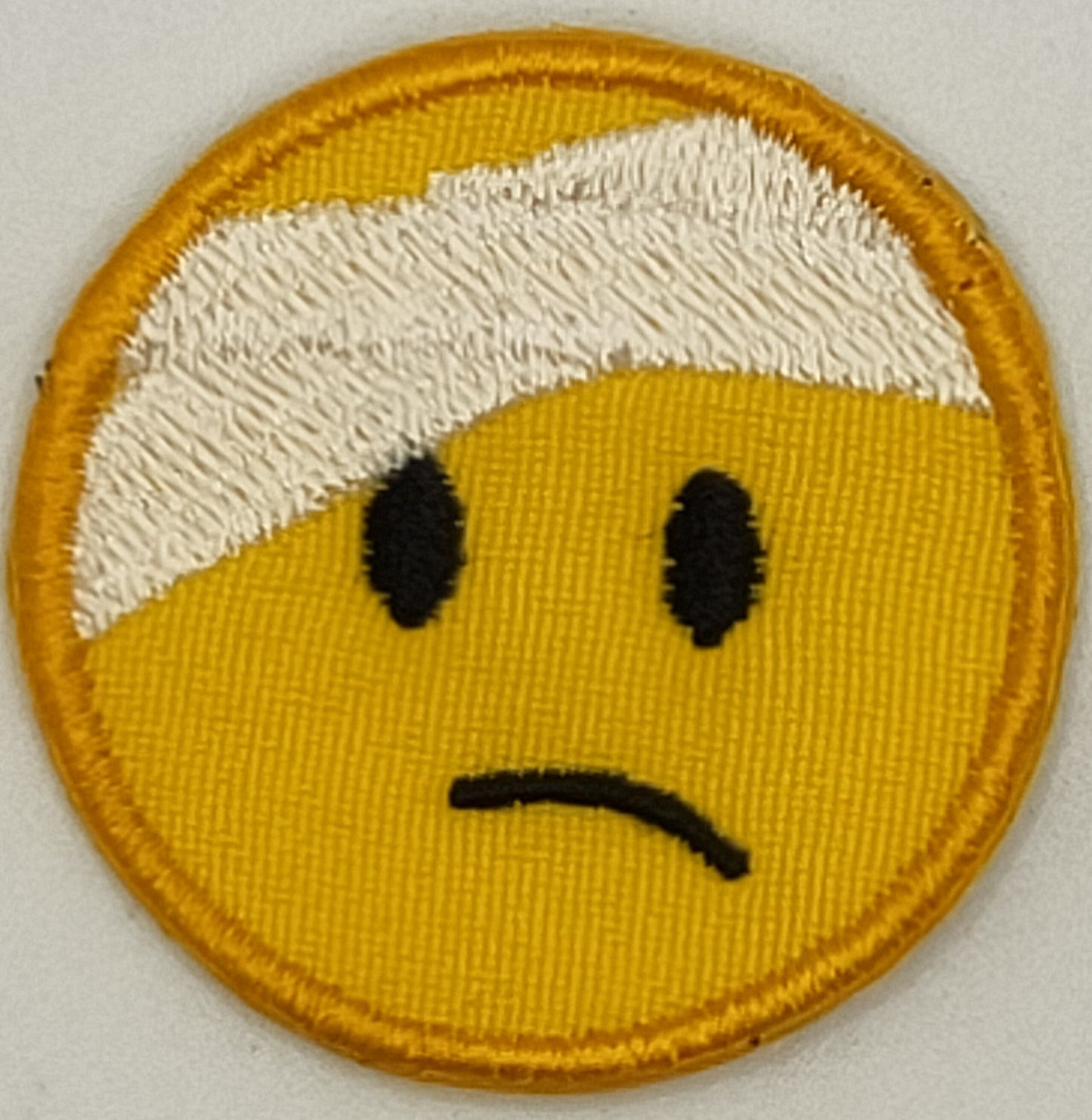 Face With Head-Bandage