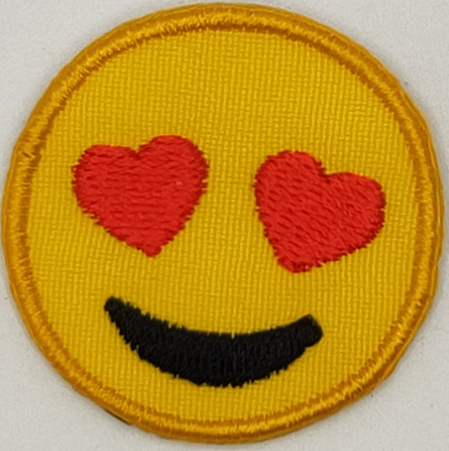 Smiling Face With Heart-Eyes