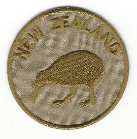 embroidered kiwi with new zealand in words, circular, gold made in new zealand