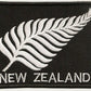 Partially embroidered silver fern patch of new zealand in black & white includes new zealand in text made in new zealand